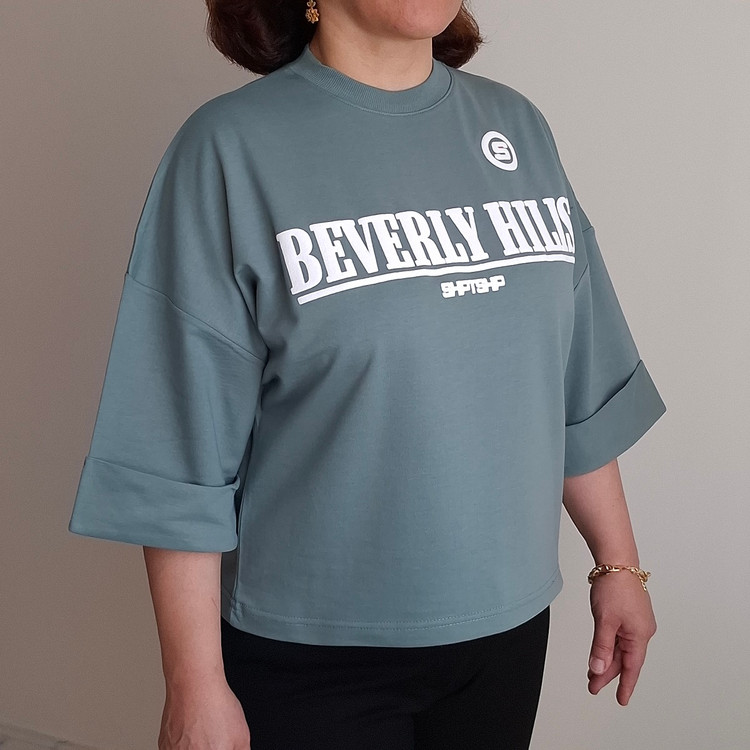 نمای کنار تیشرت زنانه نخ پنبه باکسی Beverly Hills رنگ فیلی