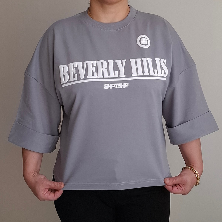 تیشرت زنانه نخ پنبه باکسی طرح Beverly Hills رنگ طوسی مناسب تا سایز 46